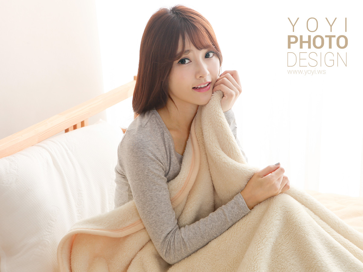 專業棉被保暖毯攝影作品，特寫展現柔軟細緻的毛絨材質。