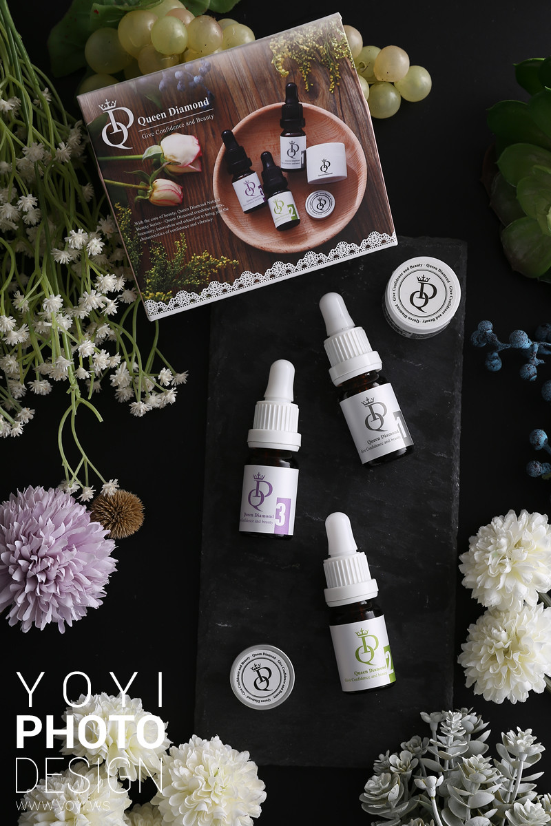 美妝保養品攝影｜質感深色精華液與紫色乾燥花美感視覺攝影 1